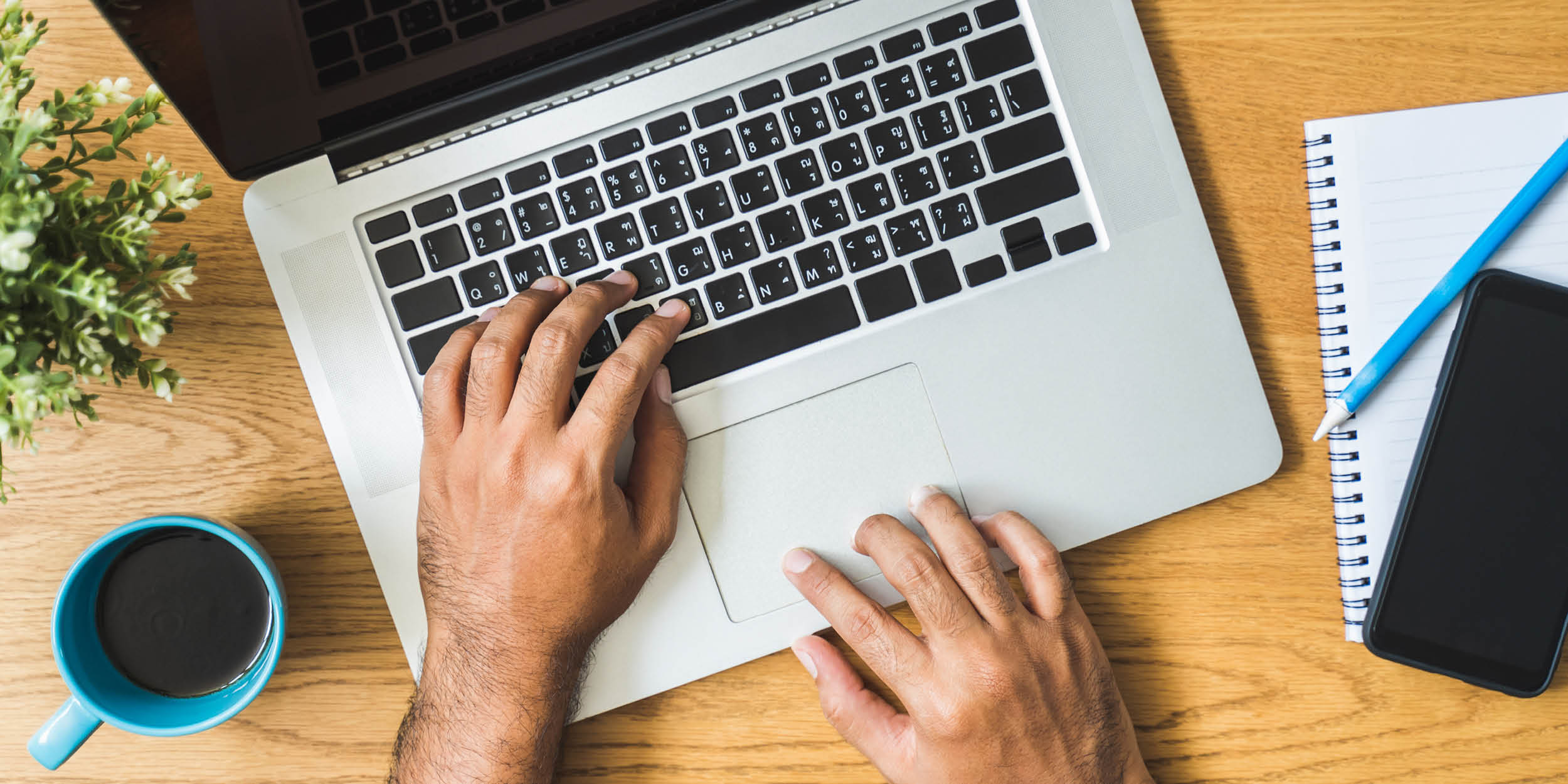 Hands on a computer keyboard