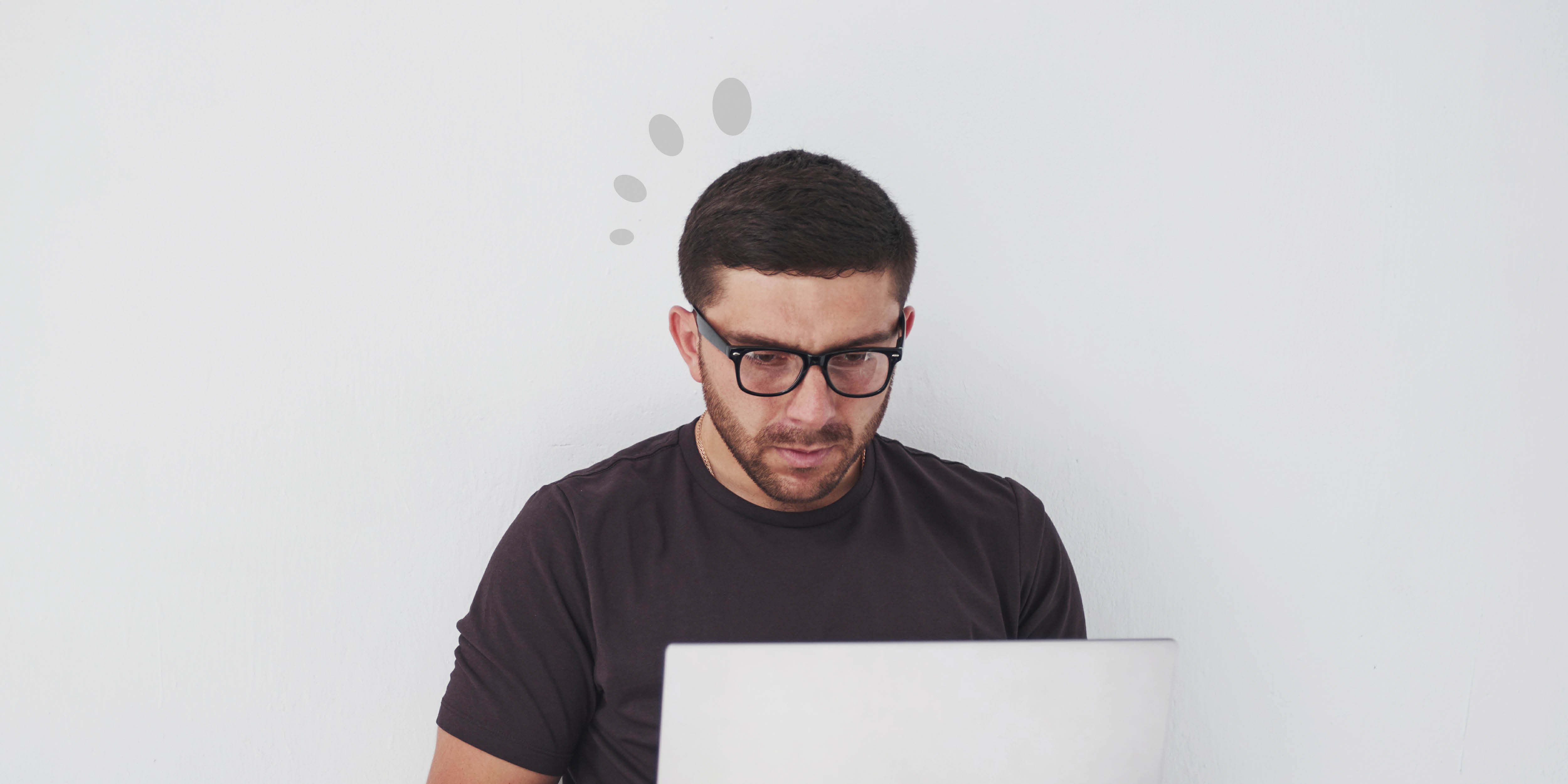 Man on a computer doing online learning